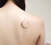 feminine moon and stars tattoo